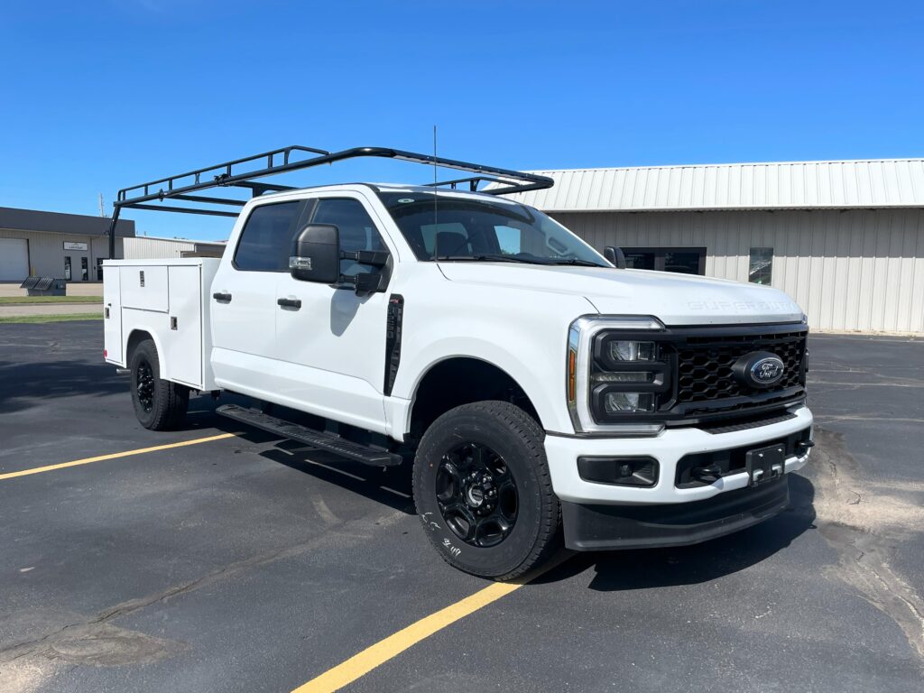 Reading Classic II steel service body equipped with Kargo-Master Pro II ladder rack and G-2 Tommy Gate liftgate